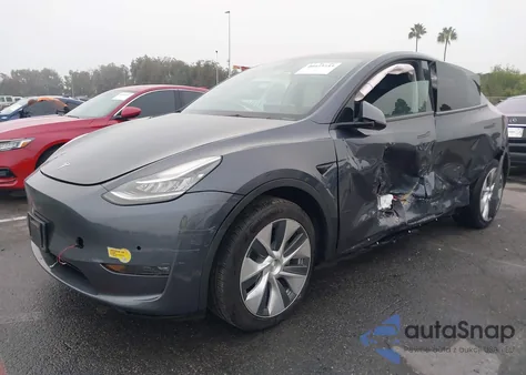 2022 Tesla Model Y z USA, uszkodzony, nr VIN 7SAYGDEE5NF402294